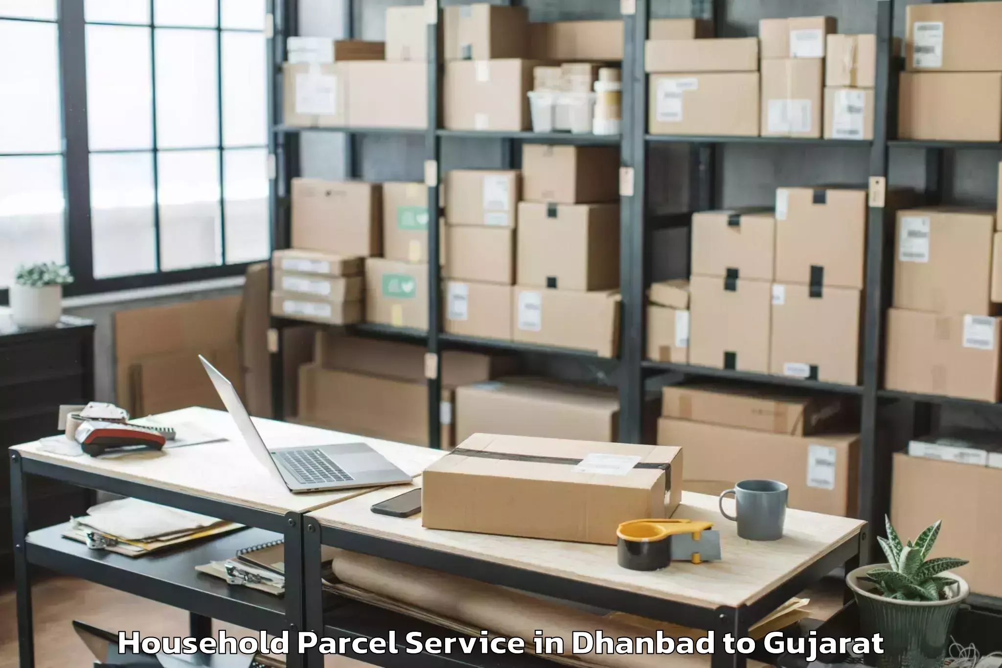 Top Dhanbad to Rajkot Airport Raj Household Parcel Available